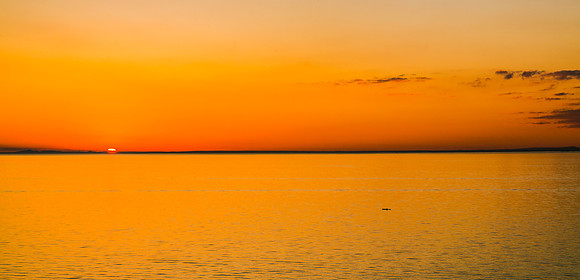 Lone Kayak at Sunset